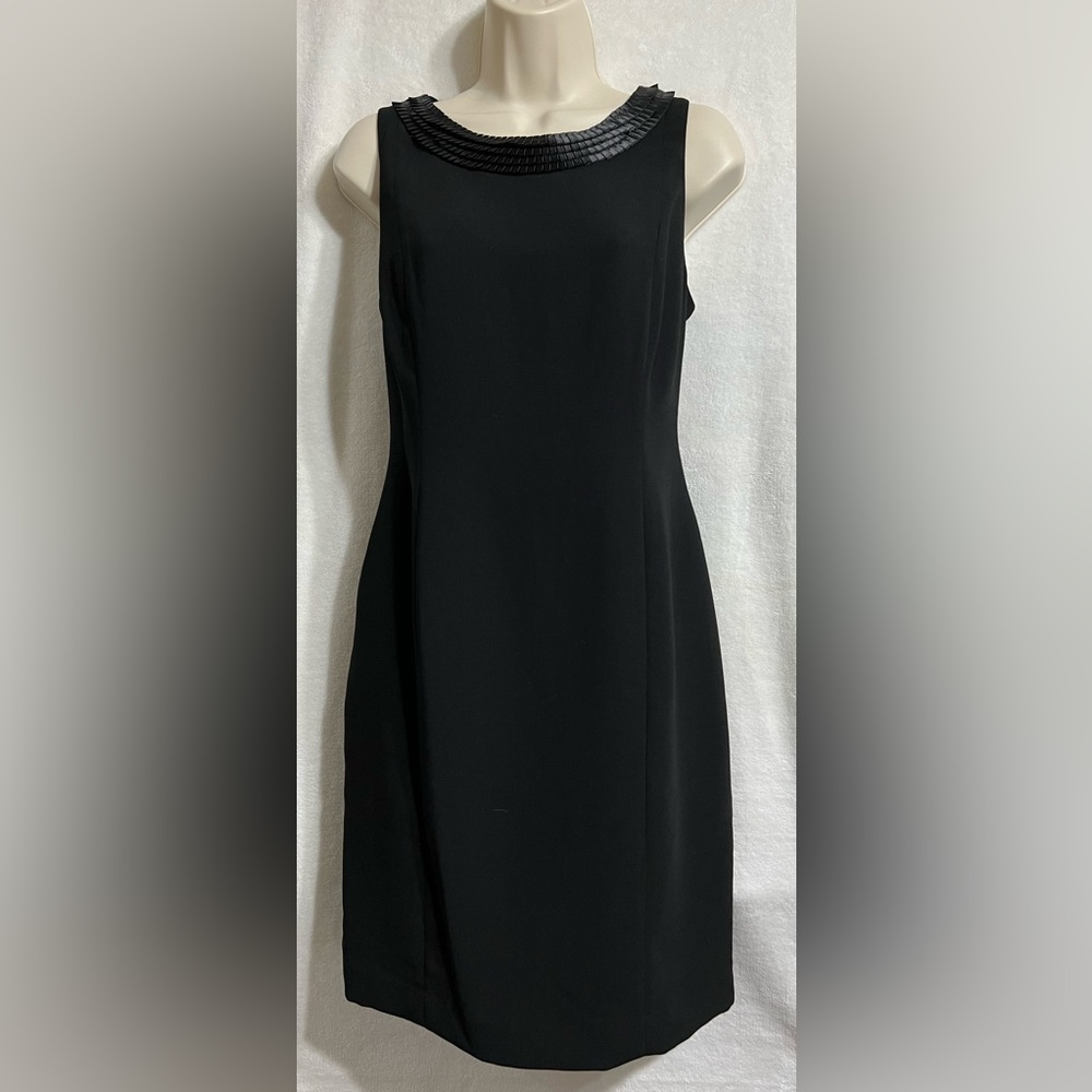 Calvin Klein woman’s black, mid length dress with ruffle accent size 10